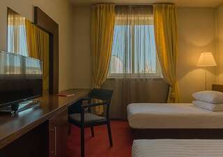 Отель Hotel Concordia Тыргу-Муреш Двухместный номер с 2 отдельными кроватями и окном-6